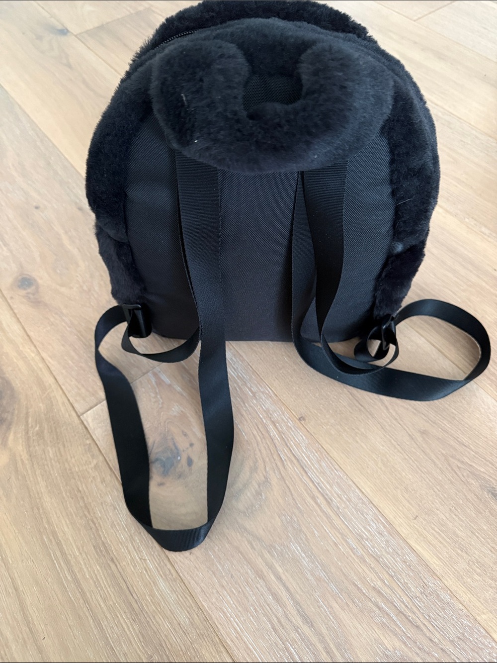 Cozy Black Faux Fur Backpack with White Swoosh - Picture 4 of 9